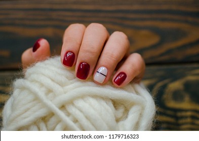 Luxury short manicure Burgundy black background  cozy autumn nails 