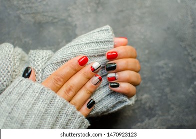 Luxury short manicure dark wooden background  cozy autumn nails  Red   black color nails 