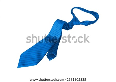 Luxury silk blue necktie on a white background.