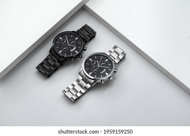 Luxury silver watch on white Table. Business man accessories - Powered by Shutterstock