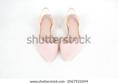 Luxury stylish baby pink heels shoes on white background