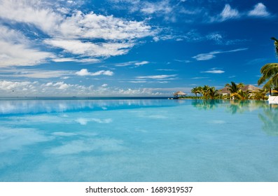 Luxury Swimming Infinity Pool In The Tropical Hotel