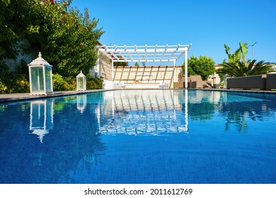 Luxury Swimming Pool And Patio Of A Residential Aegean Or Mediterranean Villa.