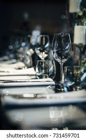 Luxury Table Settings For Fine Dining With And Glassware, Beautiful Blurred  Background. Preparation For Holiday  Christmas And Hannukah Dinner Night.