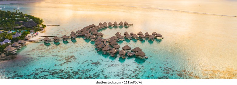 Luxury Travel Vacation Destination Panoramic Banner. Romantic Honeymoon Getaway In Overwater Bungalows Villas Of Tahiti Resort, Bora Bora, French Polynesia. Landscape Copy Space Panorama.