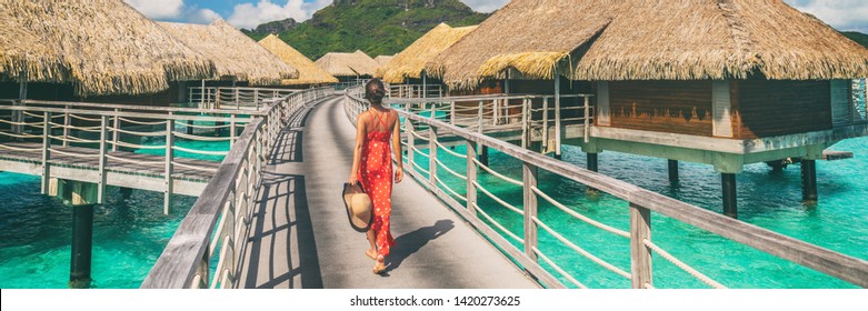Luxury travel vacation destination panoramic banner. Romantic honeymoon getaway in overwater bungalows villas of Tahiti resort, Bora Bora, French Polynesia. Landscape copy space panorama.