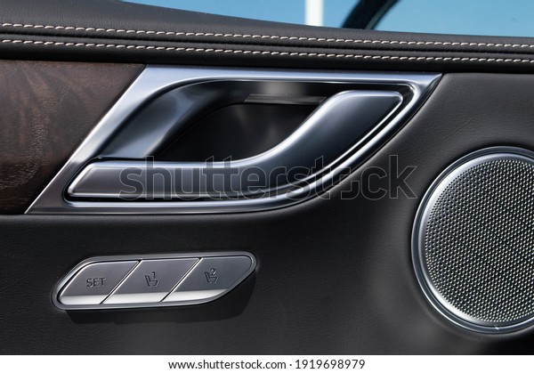luxury vehicles
clean interior and door
handle.