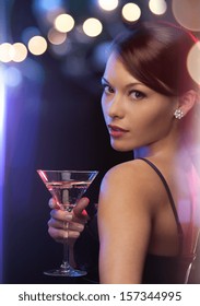 Luxury, Vip, Nightlife, Party Concept - Beautiful Woman In Evening Dress With Cocktail