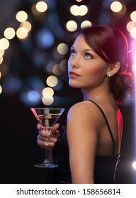 Luxury, Vip, Nightlife, Party Concept - Beautiful Woman In Evening Dress With Cocktail