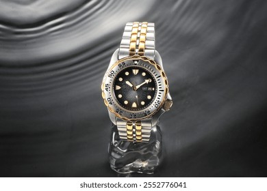 Luxury watch with black dial and stainless steel strap on water ripple background.  - Powered by Shutterstock