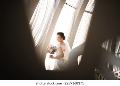 Luxury wedding bride, girl posing and smiling with bouquet - Shutterstock ID 2259168371