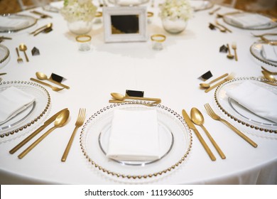 Luxury Wedding Reception Dinner Table Setup With Copper Fork And Spoon Set