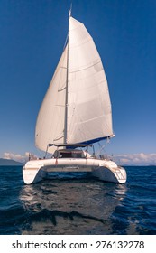 Luxury White Catamaran Floating In The Ocean