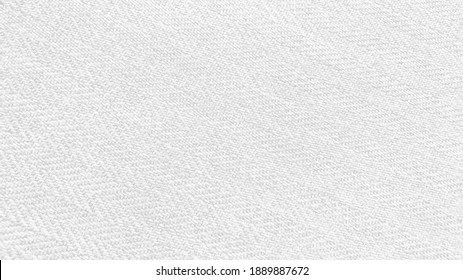 Luxury White Fabric Background .the Texture Of The Herringbone Pattern Fabric. White Knit Fabric With Geometric Patterns Of Wool And Cotton.