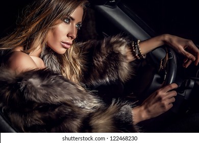 Luxury Woman In A Car.