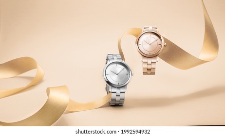 Luxury women watches floating on ribbom on seamless background concept - Shutterstock ID 1992594932