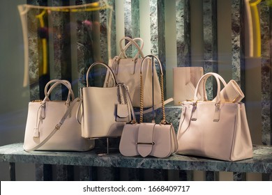Luxury women's bags In shop window. Sale