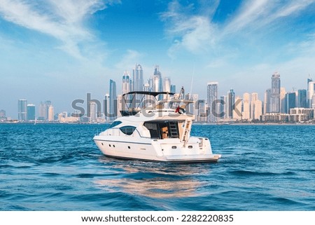 Luxury Yacht with Dubai skyline