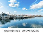 Luxury yacht marina. Docked luxurious yacht boat. Luxury lifestyle. Motorboat at sea. Summer vacation. Marina bay. Motorboat yacht sailing at sea. Yachting boat tourism. Motorboat sea marina