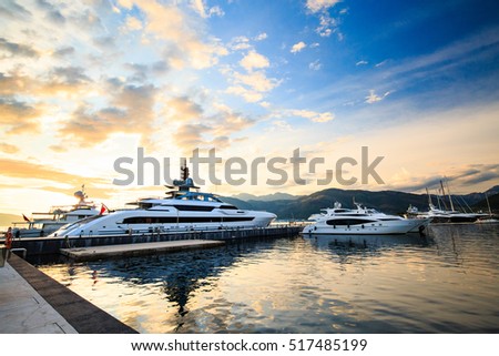 Luxury yacht marina. Port in Mediterranean sea at sunset.