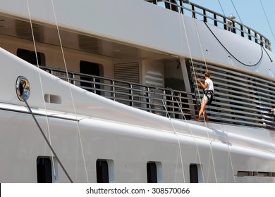 Luxury Yacht Moored On Harbor, Being Cleaned