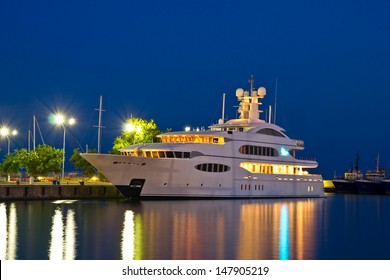 Luxury Yacht In The Port At Night