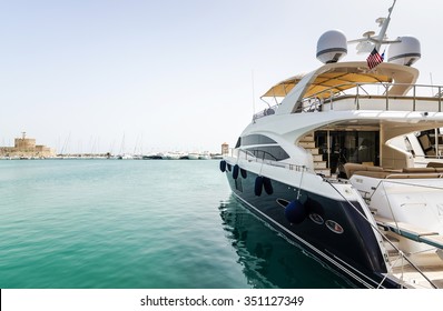 Luxury yacht in Rhodes harbor - Powered by Shutterstock