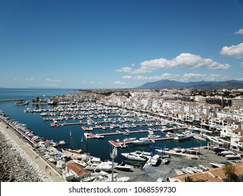 Luxury yachts moored in the harbor of this beautiful, Spanish coastal town.An aerial view of Puerto Banus Harbour, Spain