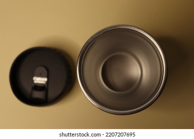 Lviv, Ukraine - 09.26.22 : Thermal Cup In The Form Of A Photo Lens On A Beige Background