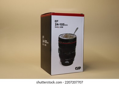 Lviv, Ukraine - 09.26.22 : Thermal Cup In The Form Of A Photo Lens On A Beige Background