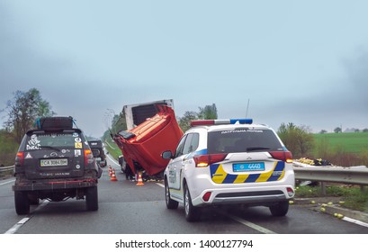 Lviv, Ukraine - 30 April 2019: Accident On Highway. Upside Down Truck And Police Car