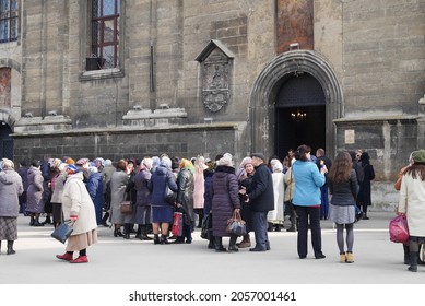 Lviv, Ukraine, 8.04.2019. Local People Gathering In Front Of The Church After Holy Mass.