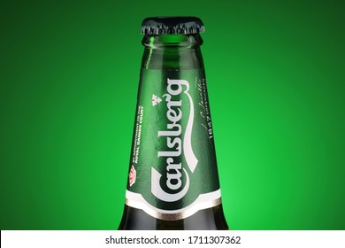 LVIV, UKRAINE - April 18, 2020: Carlsberg beer in a green glass bottle