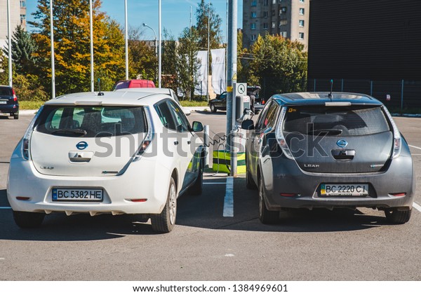 LVIV, UKRAINE - August 28, 2018:\
electric car charging at mall parking aria. pure clean\
energy