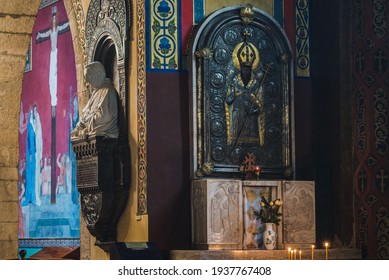 LVIV, UKRAINE - FEBRUARY 10, 2021: Interior Of The Armenian Cathedral. Bust Of Armenian Archbishop Isaak Mikolaj Isakowicz, Crucifixion And Icon Of The Gregory The Illuminator.