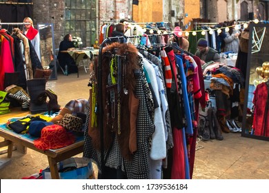 Lviv, Ukraine - February 16, 2020 : Garage Sale In Lem Station, Tlum And Cram. Colorful Hipster Vintage Clothes And Other Secondhand Goods On Flea Market. Thrift Shopping Or Donation Concept