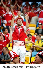 LVIV, UKRAINE - JUNE 17, 2012: Danish Football Fans Show Their Support During The UEFA EURO 2012 Game Germany V Denmark At Lviv Arena In Lviv