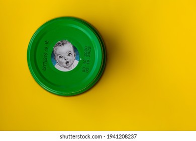 Lviv, Ukraine - March 22, 2020:  Gerber Brand Child Nutrition Puree On Yellow Background