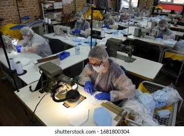 Lviv, Ukraine - March 24, 2020: Tailors Sew Protective Face Masks In City Of Lviv, Ukraine. Many People Used Face Masks As A Protective Measure Against The COVID-19 Coronavirus.