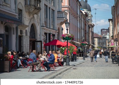 Lviv, Ukraine - May 21, 2020:  Lviv Streets During COVID-19 Quarantine. Lviv Major Andriy Sadovyi In Outdoor Cafe