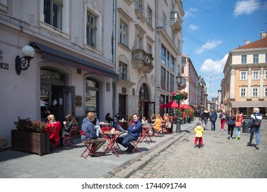 Lviv, Ukraine - May 21, 2020:  Lviv Streets During COVID-19 Quarantine. Lviv Major Andriy Sadovyi In Outdoor Cafe