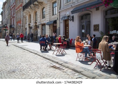 Lviv, Ukraine - May 21, 2020:  Lviv Streets During COVID-19 Quarantine. Lviv Major Andriy Sadovyi In Outdoor Cafe