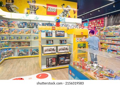 Lviv, Ukraine - May 7, 2022 : Lego Department At The Biggest Toy Store Budynok Igrashok (Toy's House). Teenage Boy Shopping At Toy Market. Selective Focus