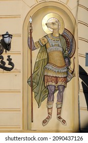 Lviv, Ukraine - November 01 2019: Fresco of Saint Christopher with dog head on facade of a building Lviv, Ukraine