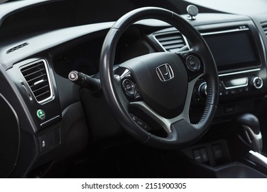 Lviv, Ukraine - September 1, 2021: Honda Civic Interior With Dashboard Panel And Steering Wheel. Driver Seat View.