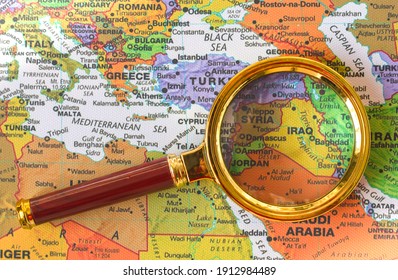 Lviv Ukraine-09 02 2021 :Syria, Iraq a map of Asia in a defocused magnifying glass, the theme of travel and trips to Syria, Iraq, Tehran, Damascus, Baghdad