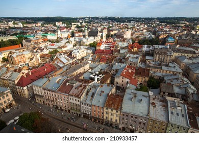 LVOV, UKRAINE - AUG 8, 2012: Top view from Lviv City Hall - building city administration of the city currently open the view point for tourists. Tower was built in 1827-1835.  - Shutterstock ID 210933457
