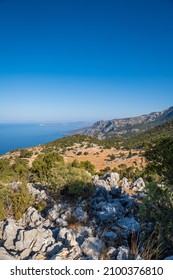 Lycian way hiking and trekking route, path, road in Mediterranean area with rocks, mountains. Mountain landscape image taken on the Lycian way trek in Turkey	
