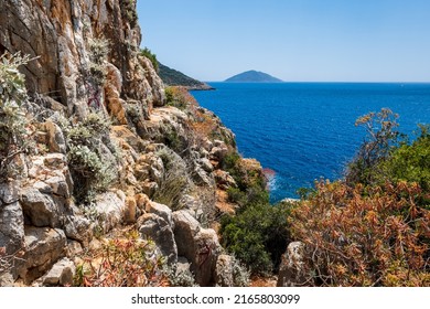 Lycian way hiking and trekking route with sea view in Turkish Mediterranean area with rocks, mountains. Mountain landscape image taken on the Lycian way hiking trail near Kas, Turkey.	
