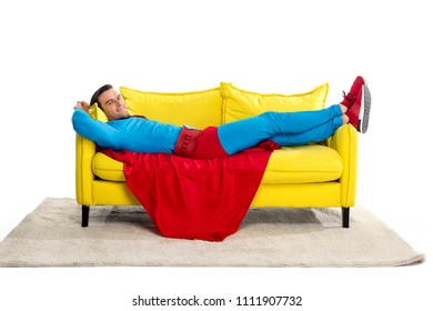  lying on couch and smiling at camera isolated on white
